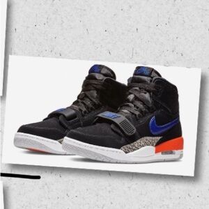 Nike Kids Black and Blue Sneakers with Orange Accents